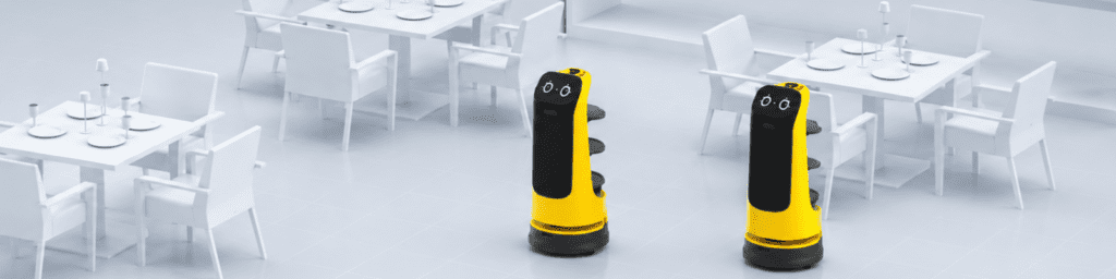 Blue Kiwi autonomous service robots operating in a modern restaurant environment, featuring multi-tier serving trays, intelligent navigation, and a compact design for efficient food and beverage delivery.